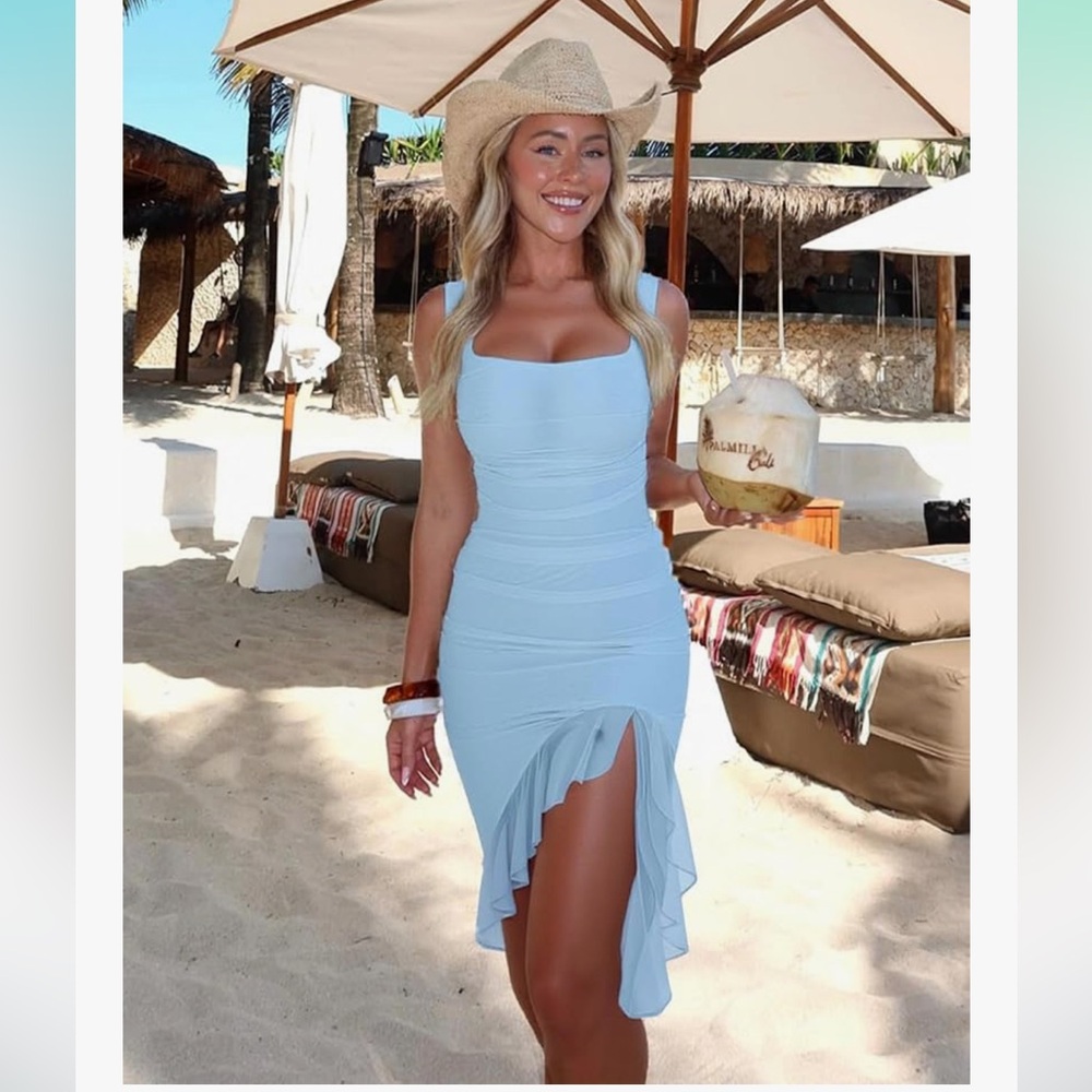 NWT Light Blue Ruffle Hem Dress stretchy soft material. Has a zipper up the back